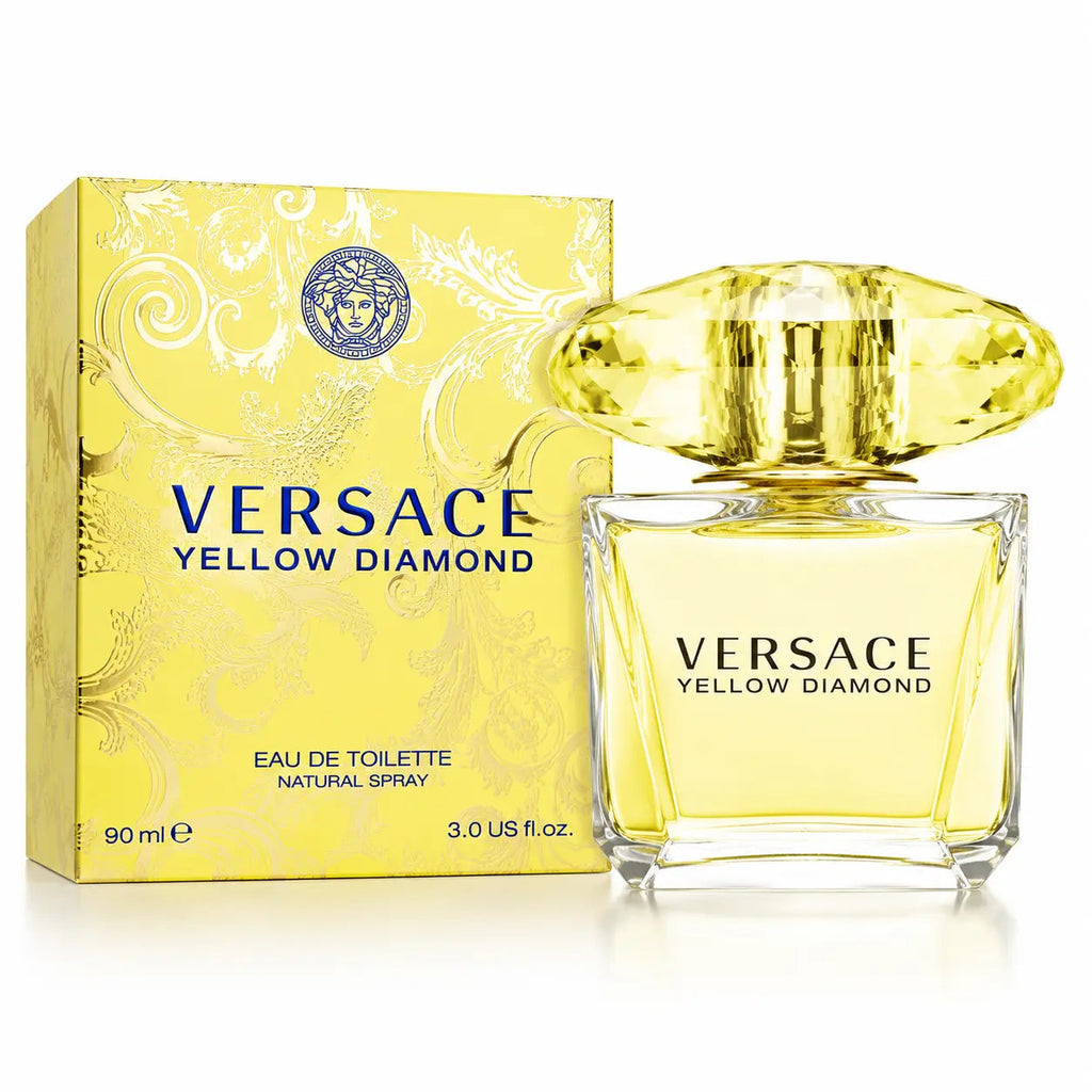 Versace Yellow Diamond Eau de Toilette natural spray bottle with a faceted yellow cap, shown next to its yellow patterned retail box on a white background.