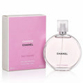 Chanel Chance Eau Tendre perfume bottle and its pink packaging box on a white background.